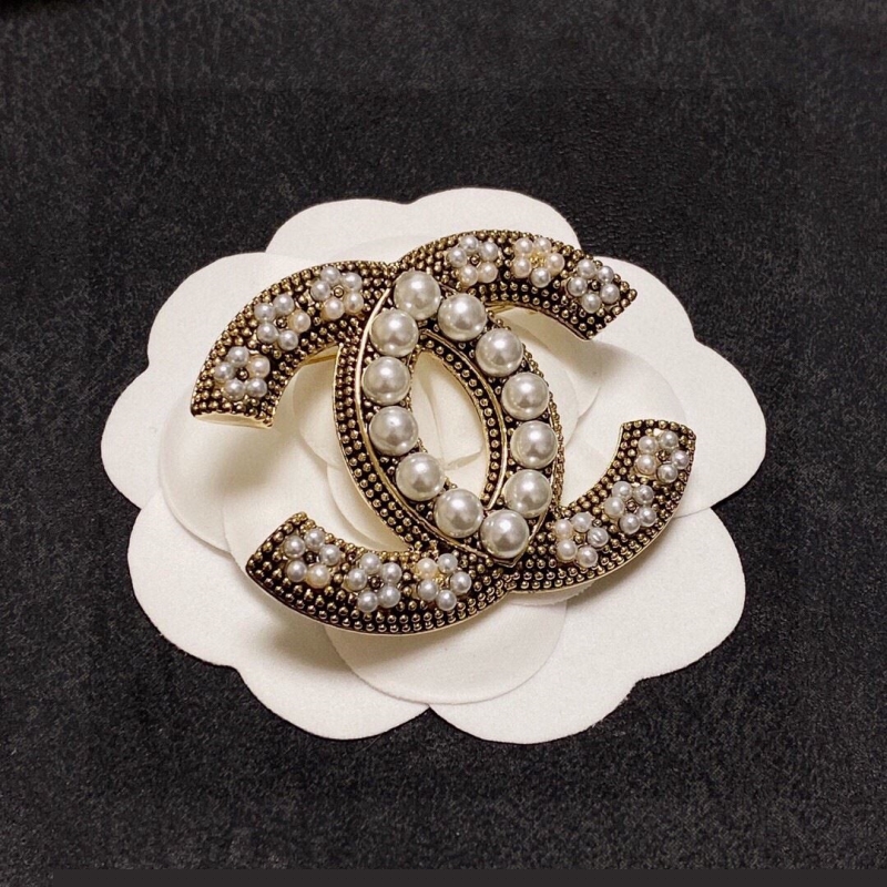Ch*el brooches
